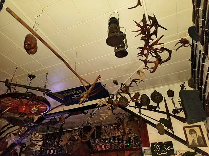 Antlers, tools and artifacts suspended from the ceiling at Stubb's
