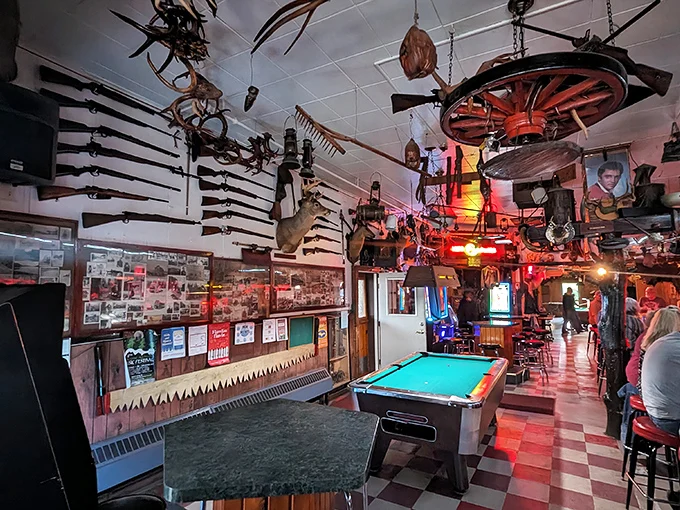 Interior view of Stubb's Museum Bar with a pool table and ceiling displays